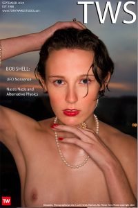 Homepage for Tony Ward Studio featuring young topless model wearing pearls